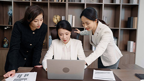 Confident Chinese business people having a meeting