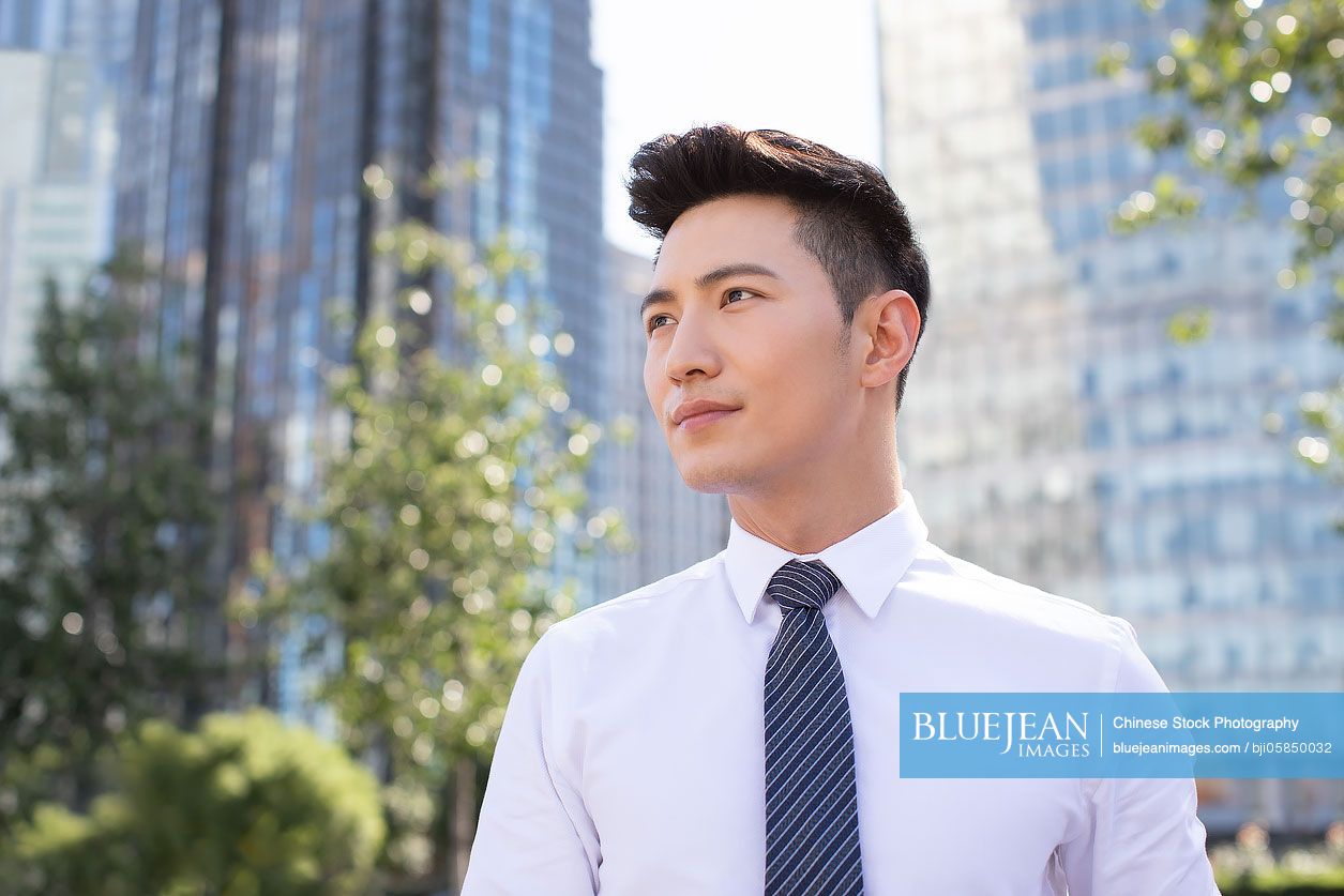 Confident young Chinese businessman