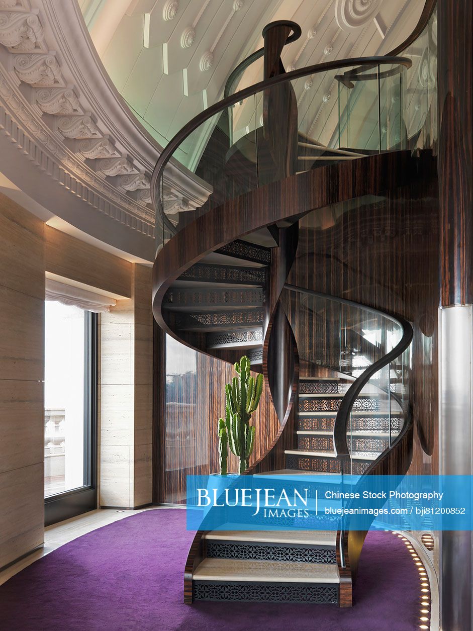 Spiral staircase with glass handrail