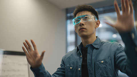 Young Chinese man wearing futuristic glasses,4K