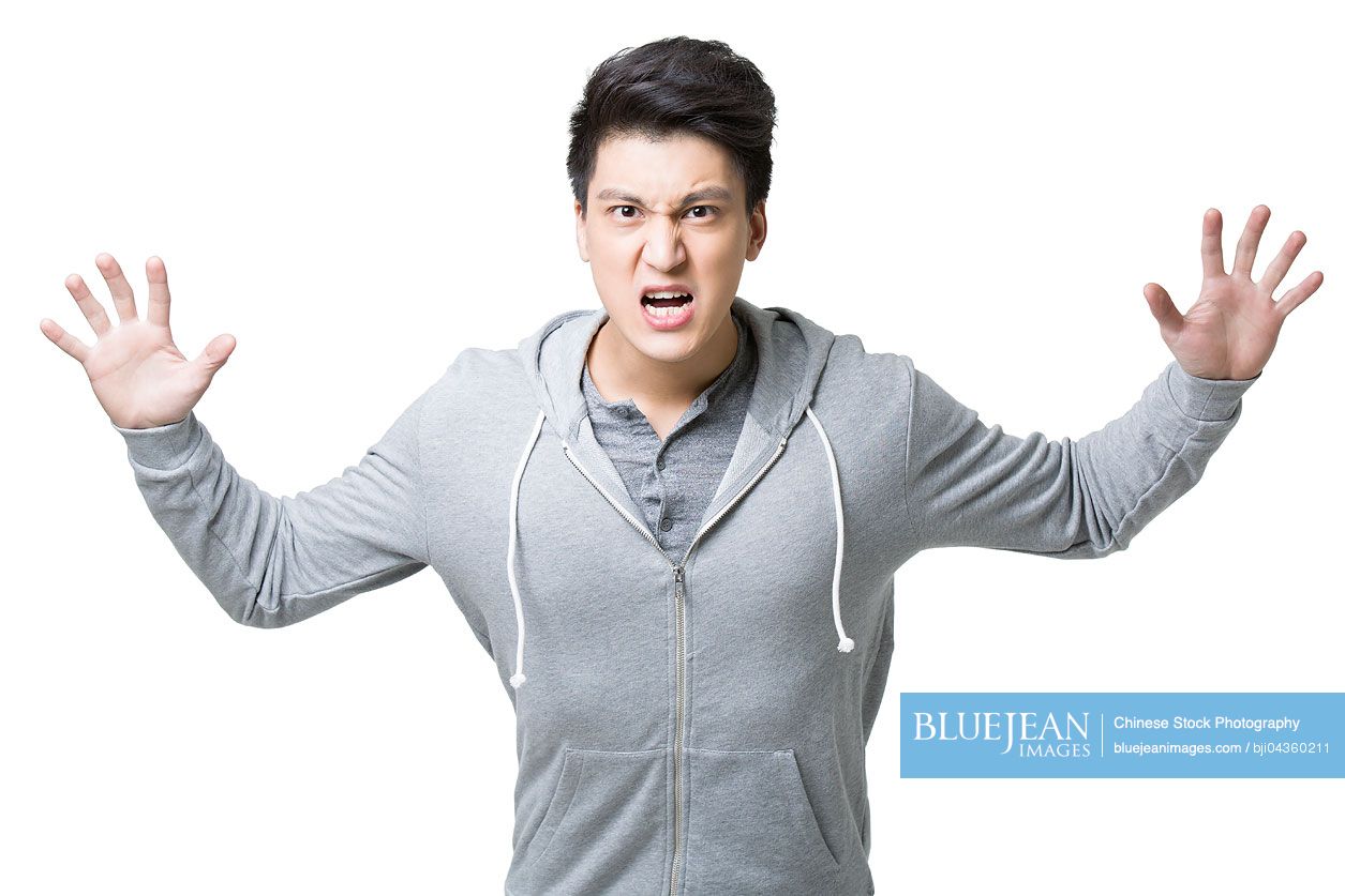 Angry young Chinese man-High-res stock photo for download