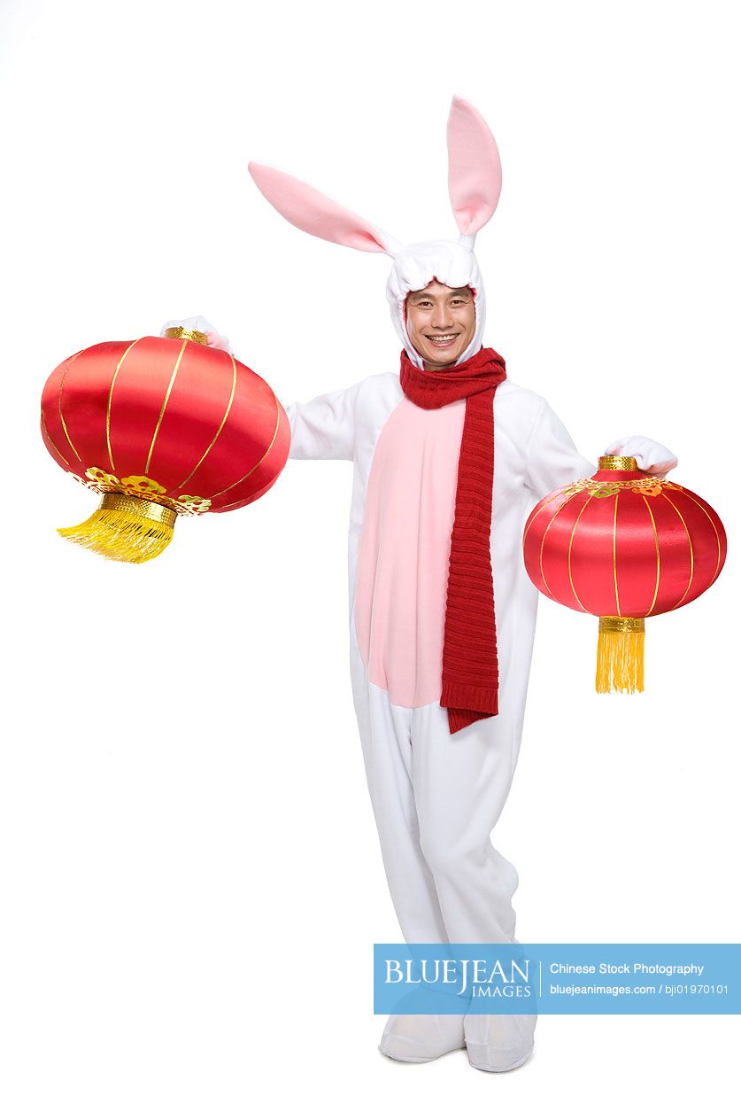 Mid-adult Chinese man celebrating the Year of the Rabbit