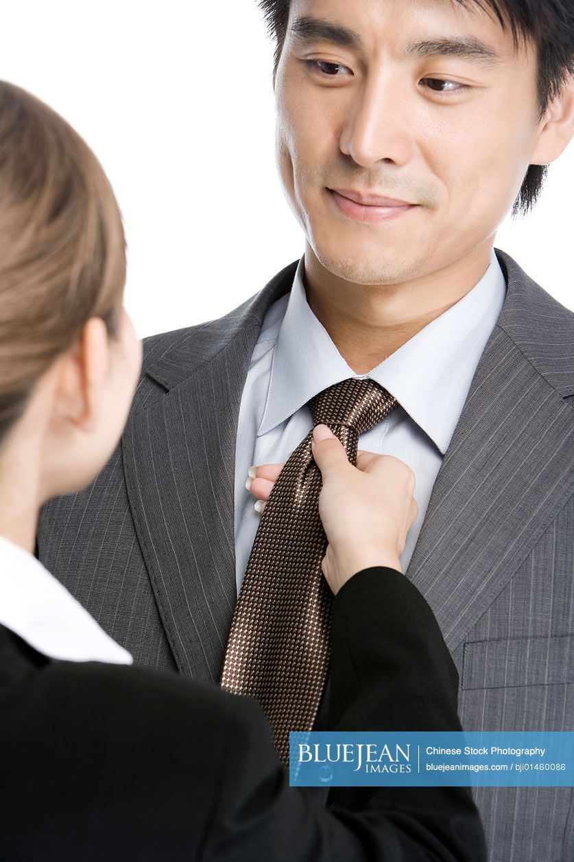 Tender moment between young working couple