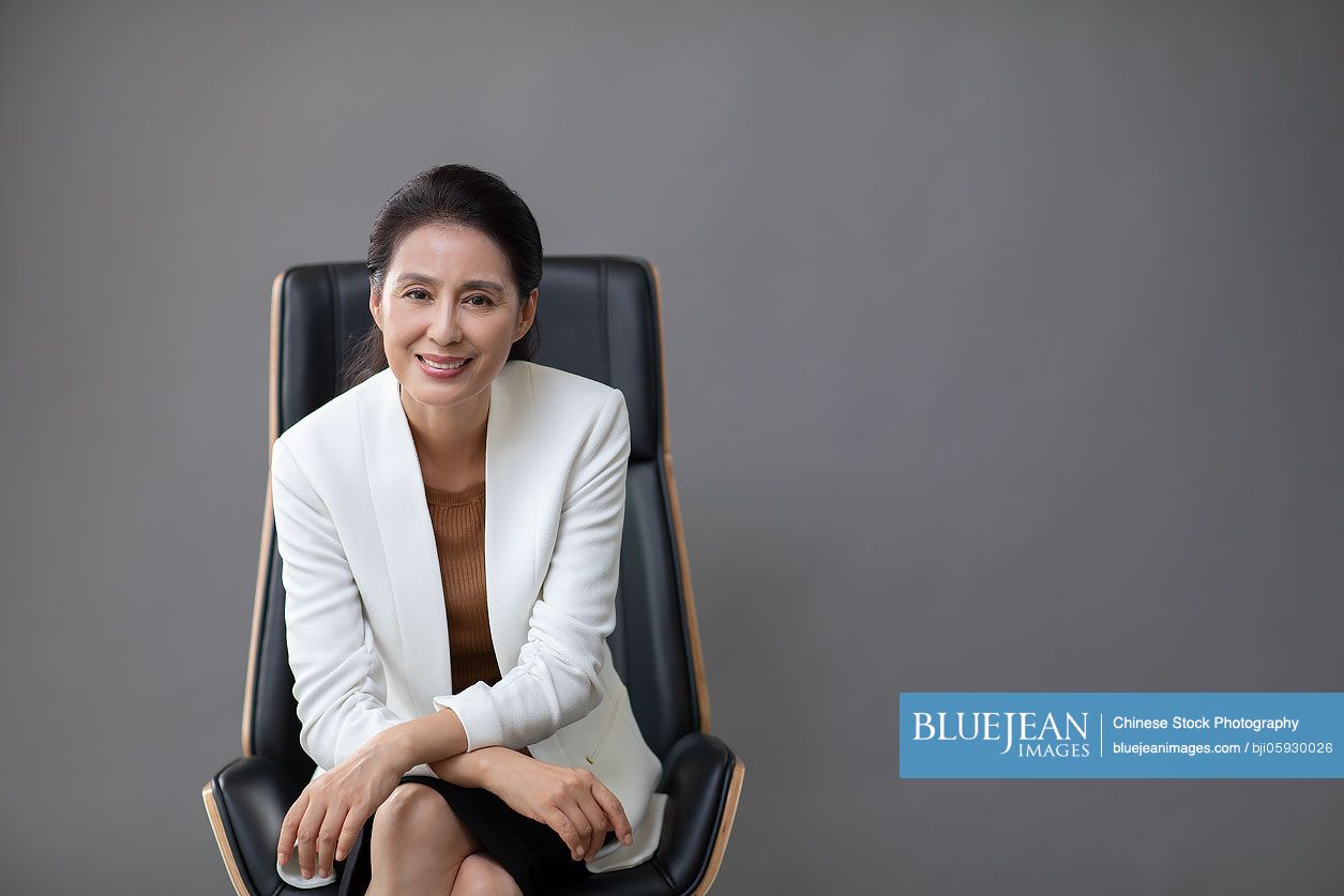 Confident mature Chinese businesswoman