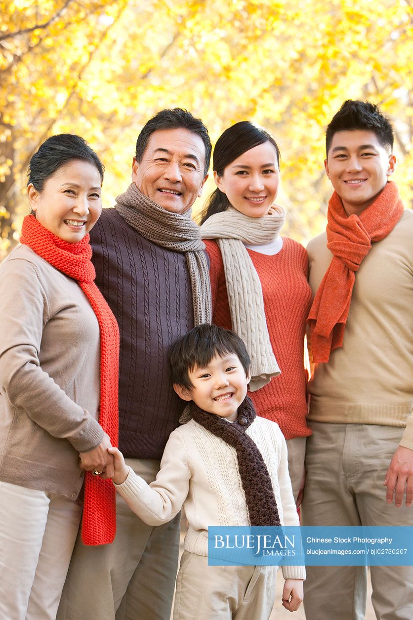 Outdoor Chinese family portrait in autumn