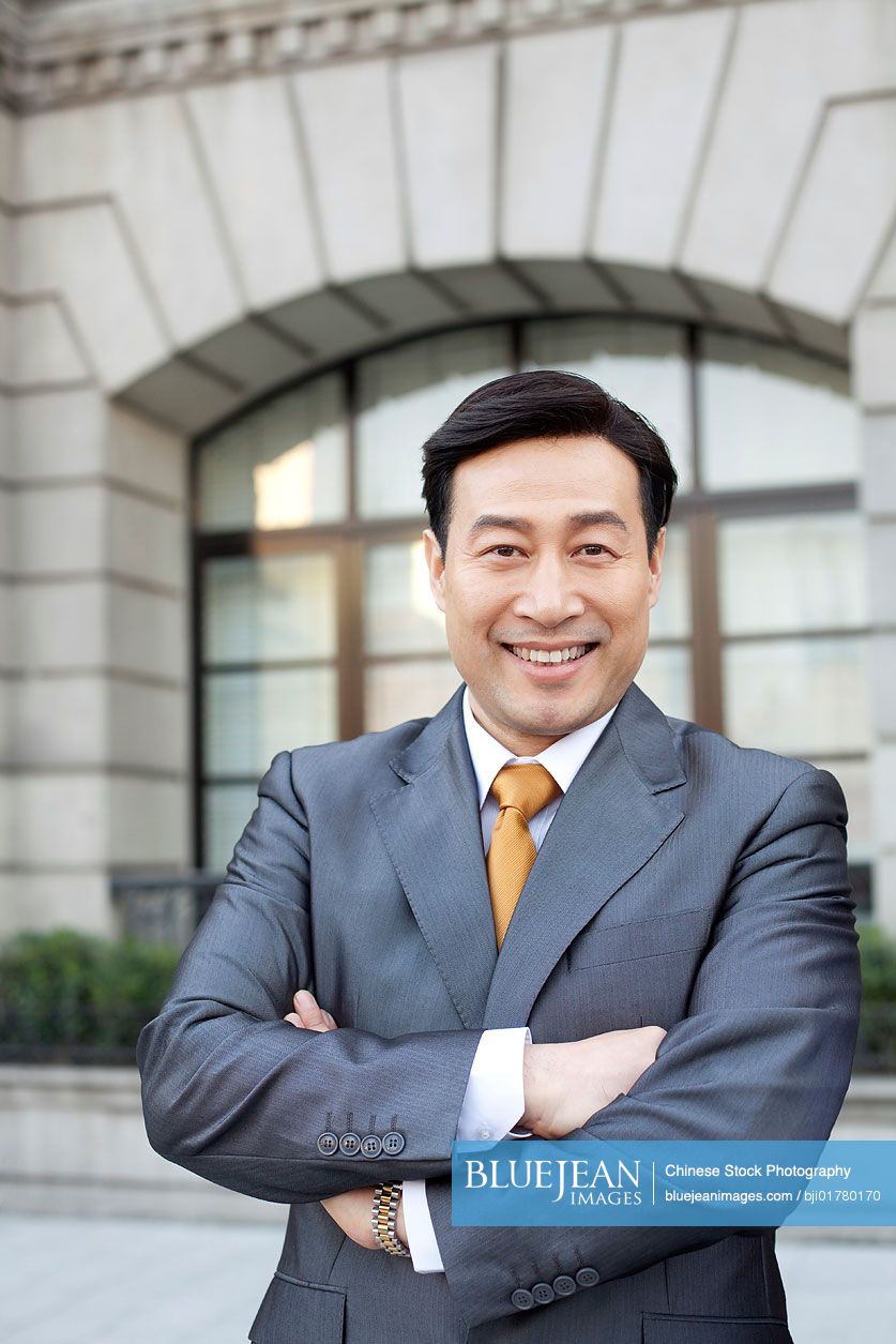 Portrait of Chinese businessman on the Bund in Shanghai