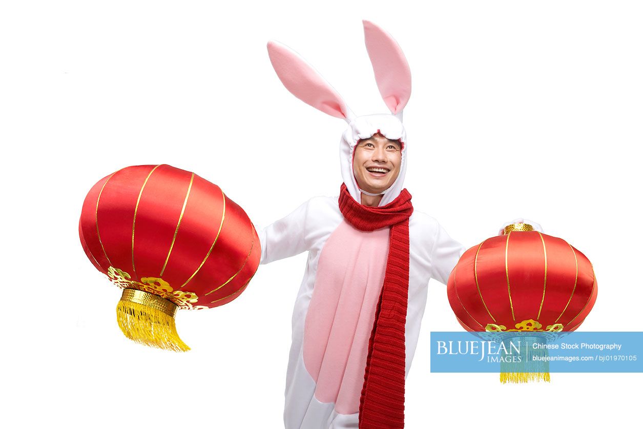 Mid-adult Chinese man celebrating the Year of the Rabbit