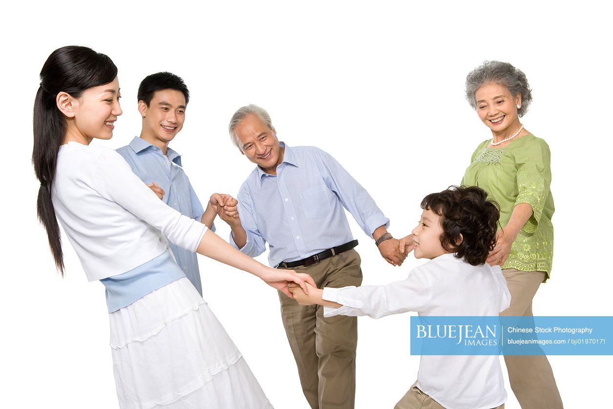Chinese family in a circle holding hands