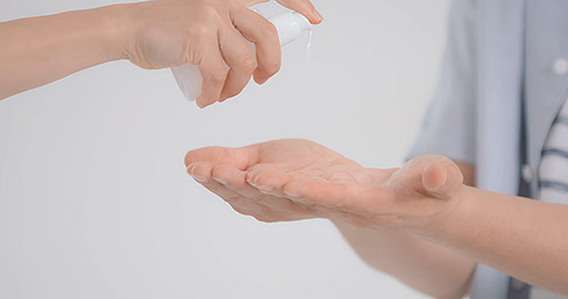 Young Chinese man using hand sanitizer,4K