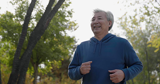 Happy senior Chinese man running in the park,4K