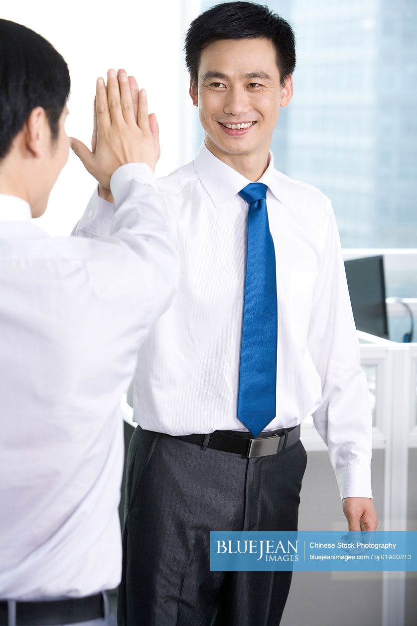 Cheering Chinese office workers