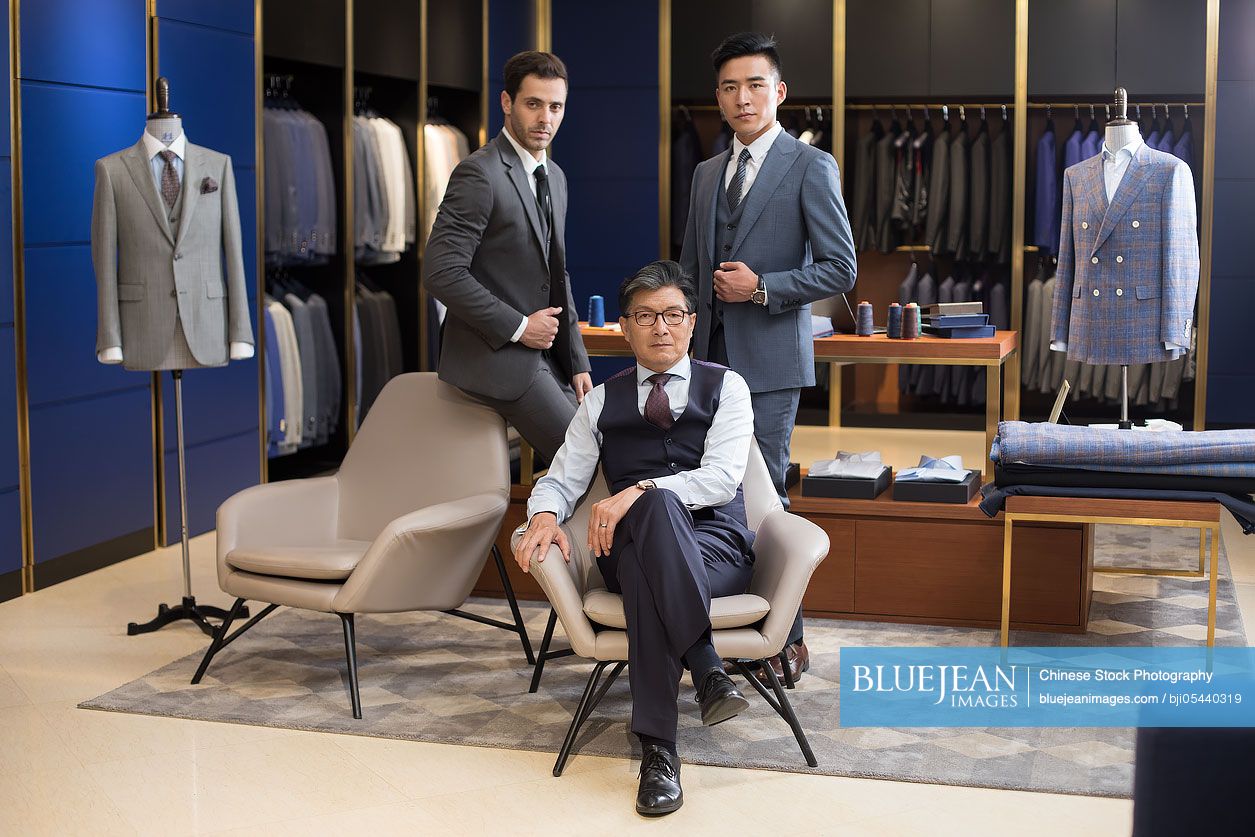 Confident Chinese fashion designer and businessmen