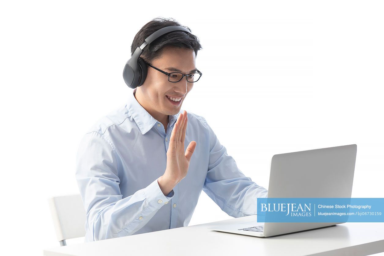 Chinese male teacher working online