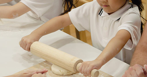 Children learning cooking in kindergarten classroom,4K