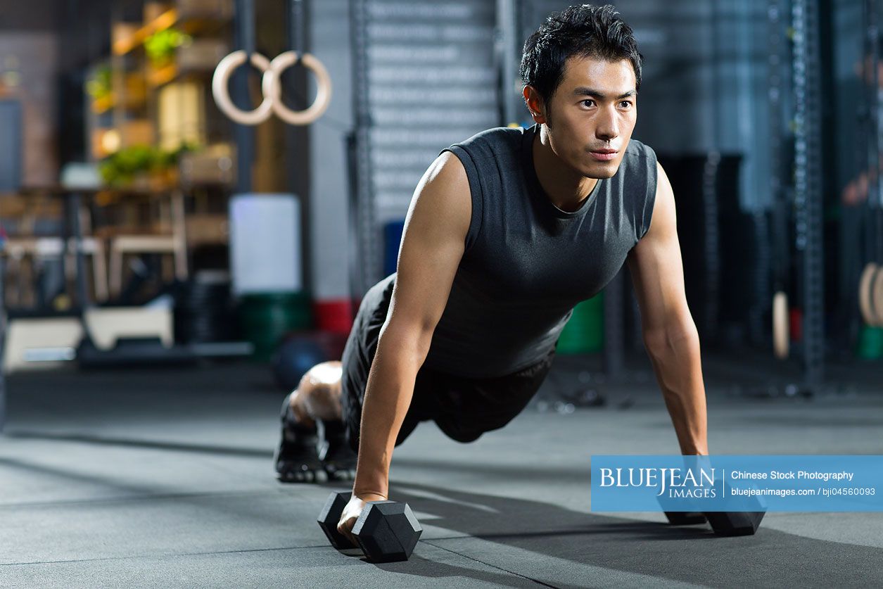 Young Chinese man practicing crossfit