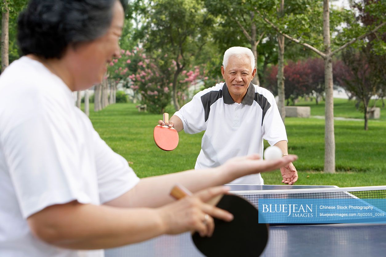 Elderly Chinese Couple Playing Ping Pong