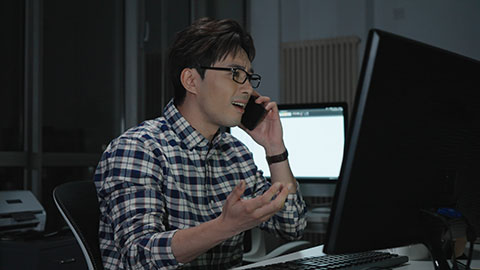 Chinese IT worker working in office at night,4K