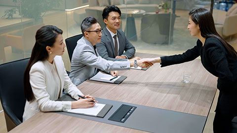 Confident Chinese businesswoman attending job interview