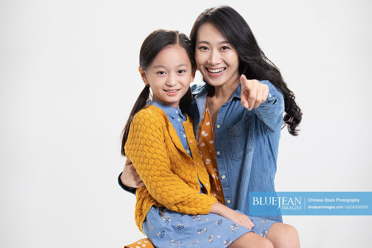 Happy Chinese mother and daughter
