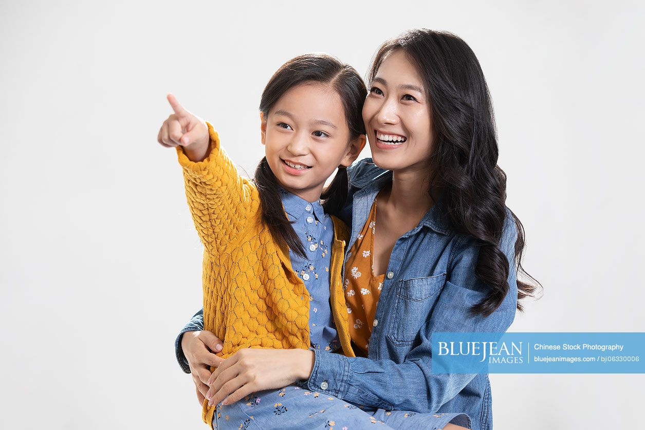 Happy Chinese mother and daughter