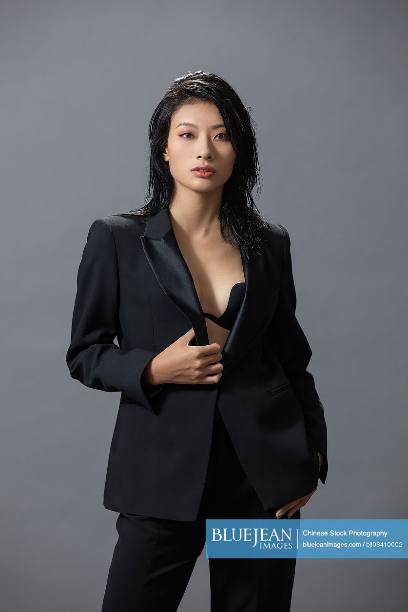 Cool young Chinese woman in suit