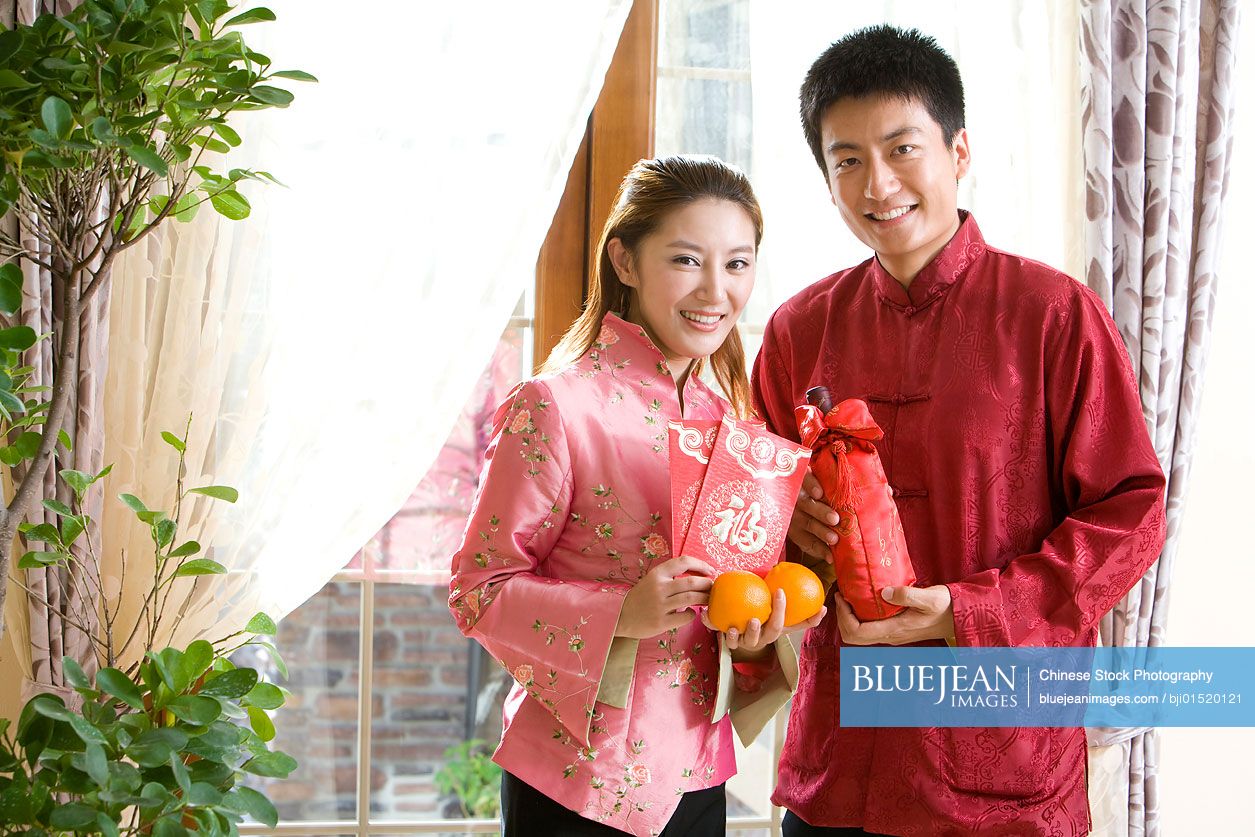 Portrait of young Chinese couple in new year