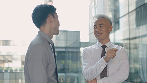 Confident Chinese business people talking,4K