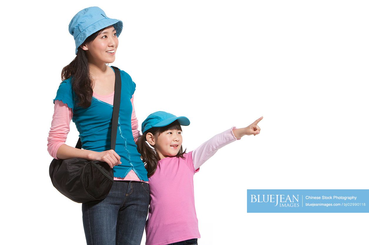 Portrait of Chinese mother and daughter travelling