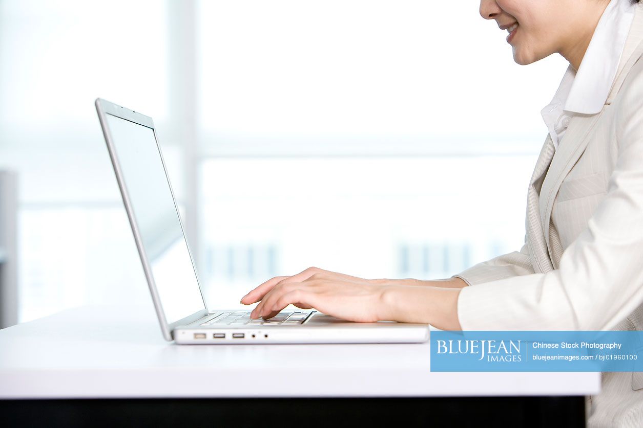 Office worker using her computer