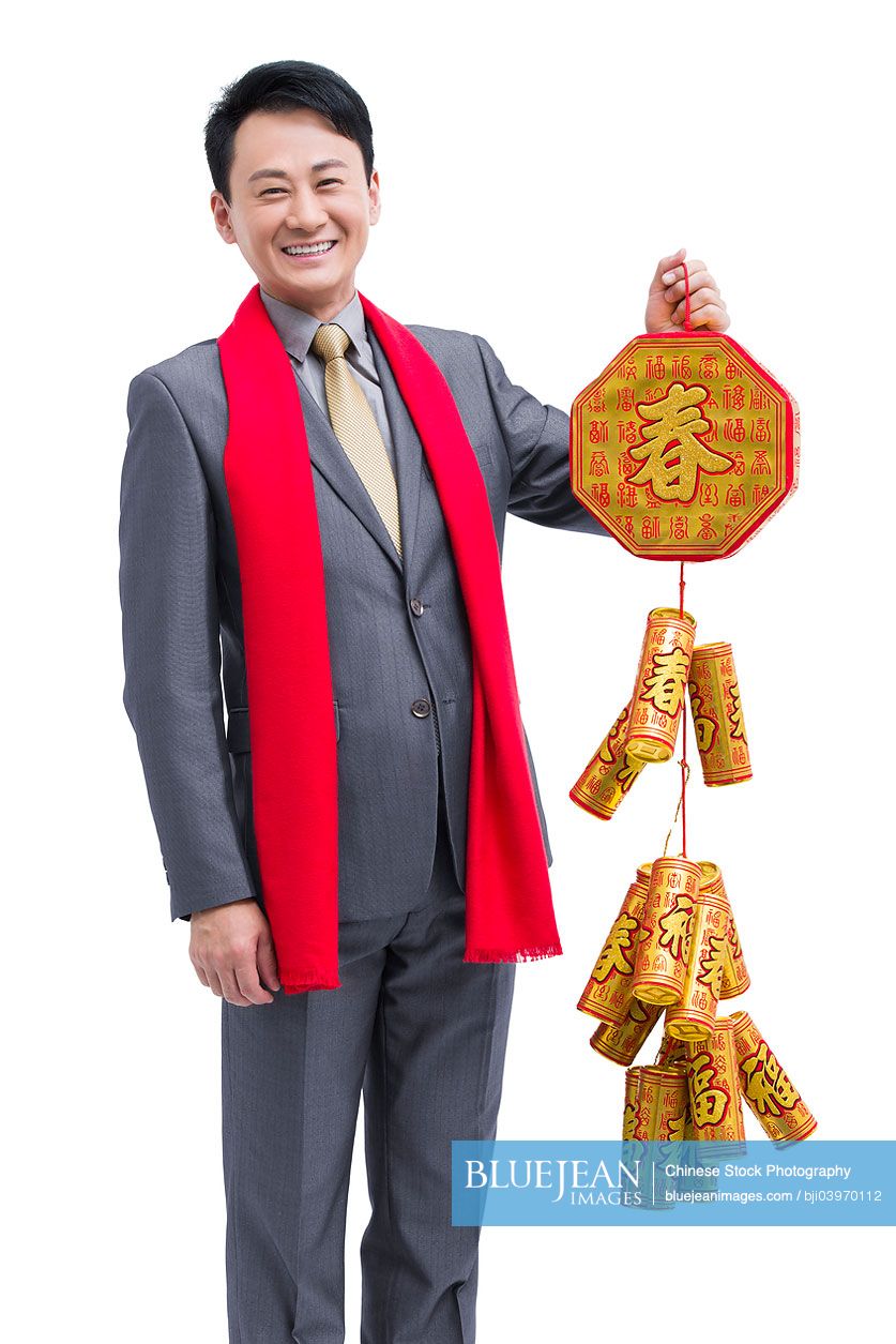 Happy Chinese businessman celebrating Chinese New Year