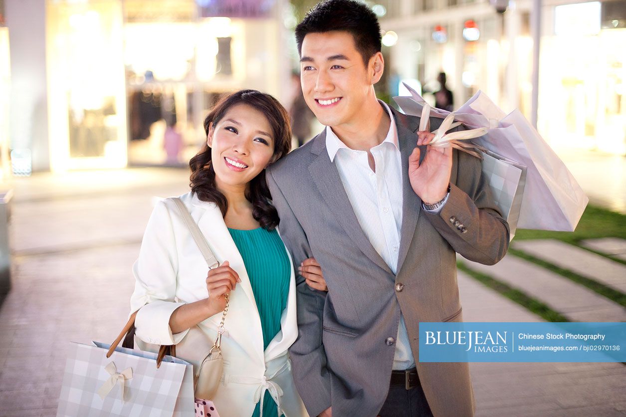 Young Chinese couple go shopping