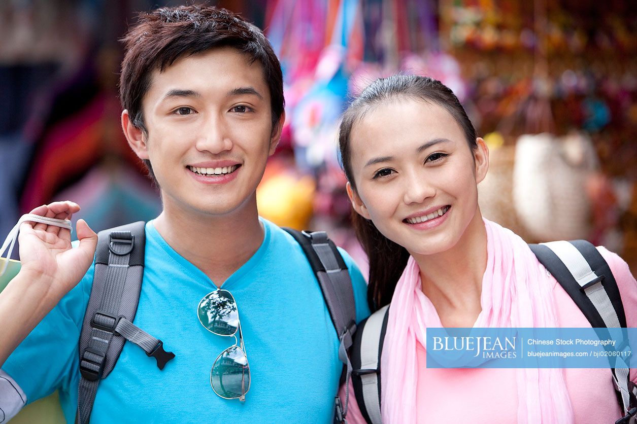 Young Chinese couple shopping in Dali