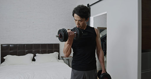 Young Chinese man exercising at home,4K