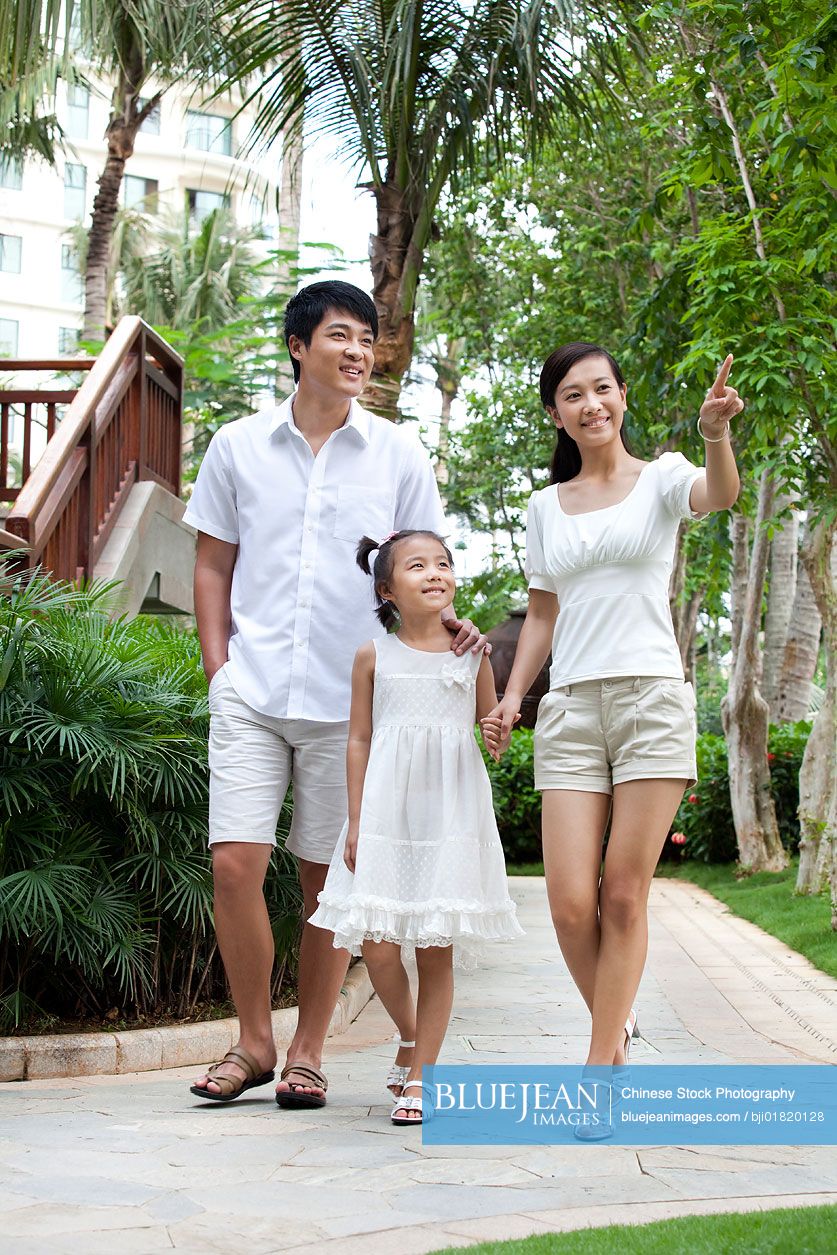 Portrait of a happy Chinese family on vacation