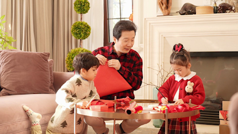Family joyfully celebrating Chinese New Year together