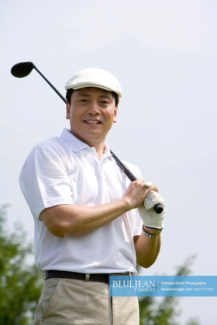 Portrait of a male Chinese golfer
