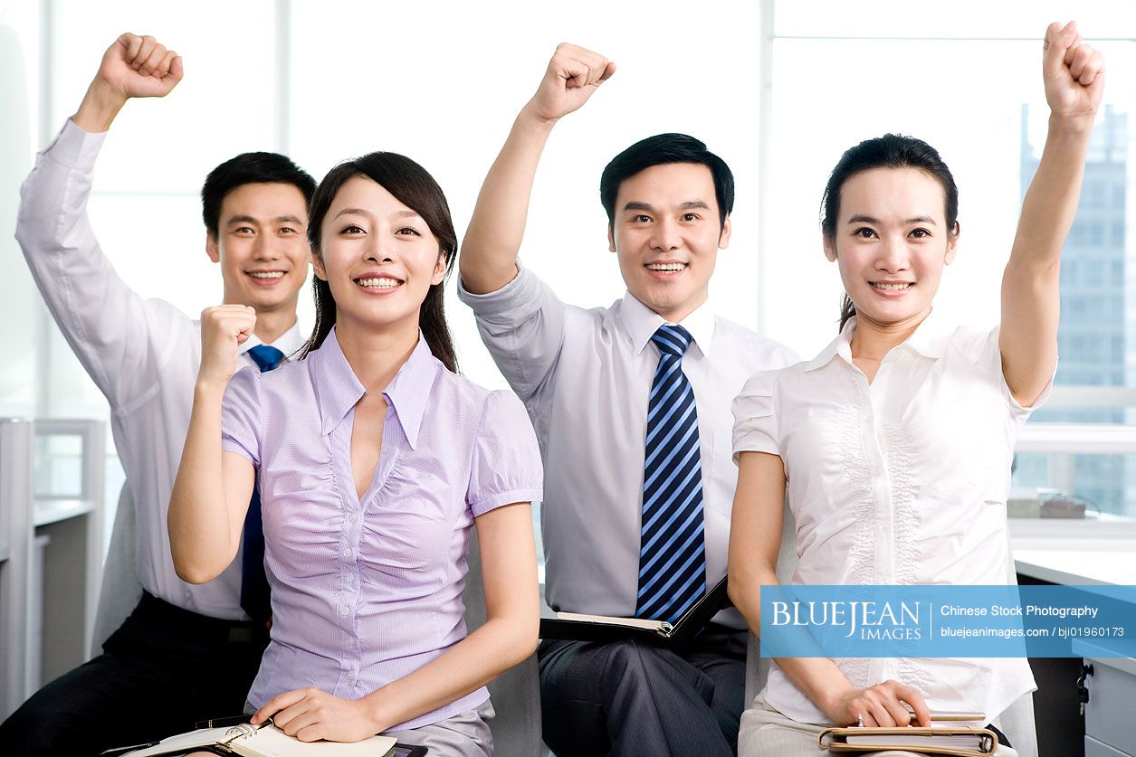 Cheering Chinese office workers