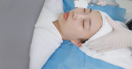 Young Chinese woman receiving face treatment in hospital,4K