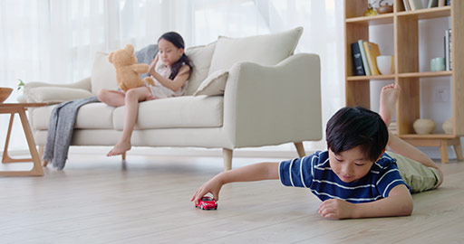 Chinese sibling playing with toys in living room,4K