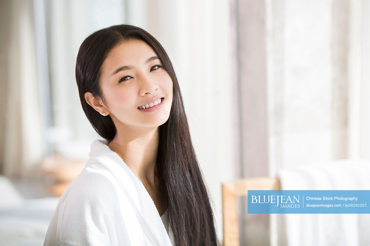 Portrait of young Chinese woman with long hair