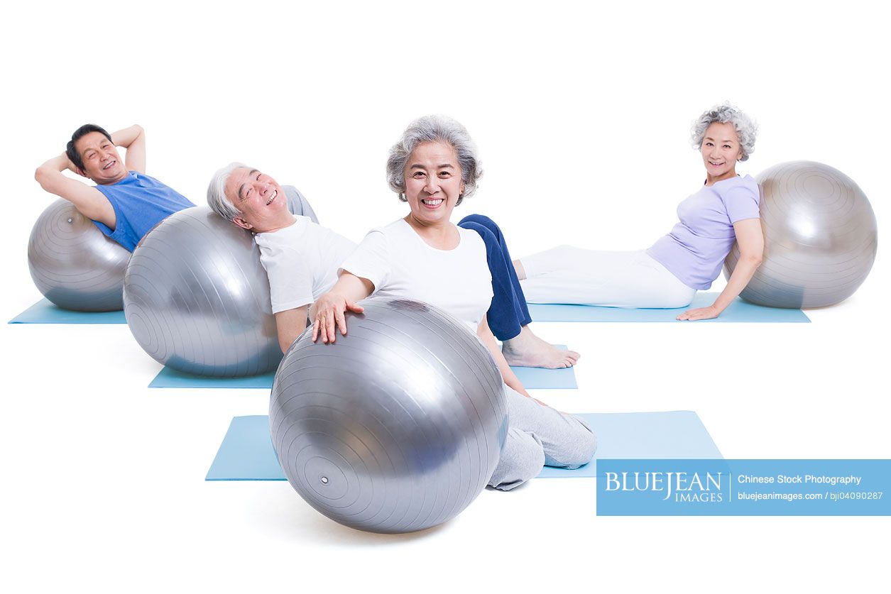 Senior Chinese adults having a rest after exercising