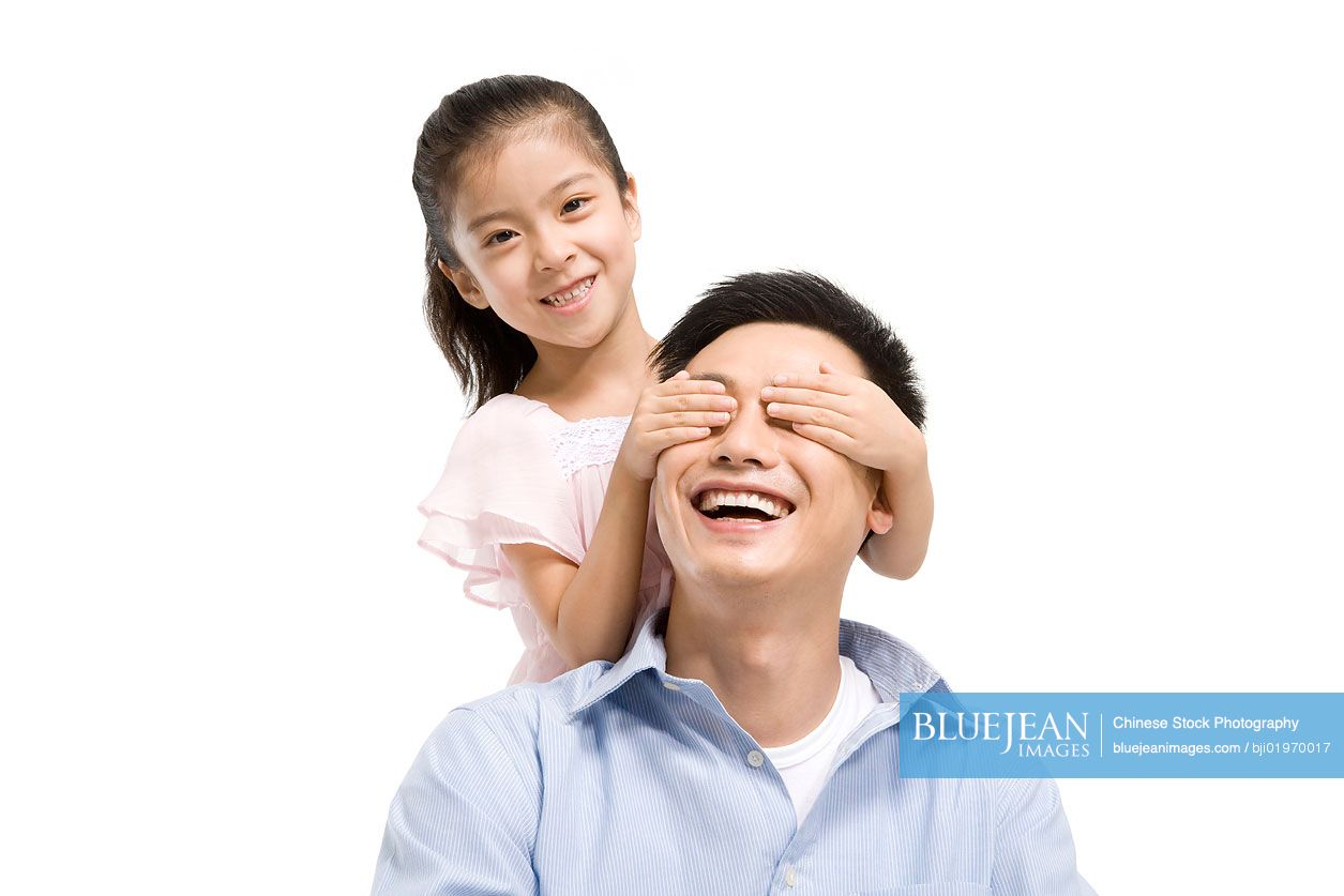 Chinese father and daughter playing