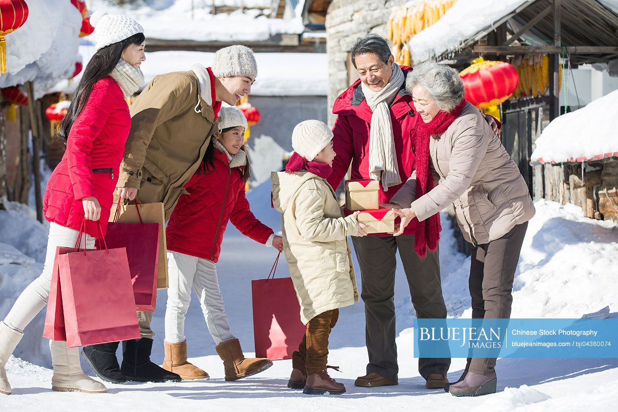 Family visiting with gifts during Chinese new year