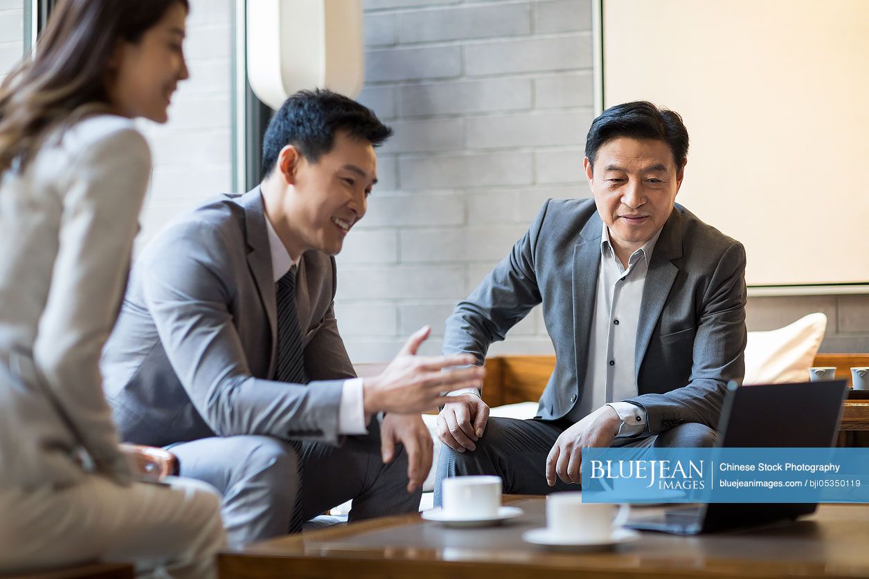 Chinese business people having a meeting