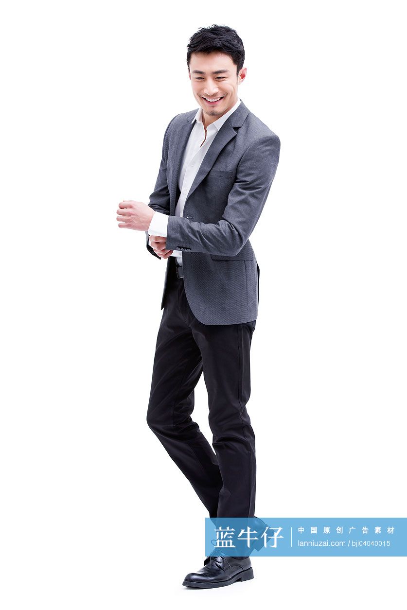 时尚的商务男士整理袖口