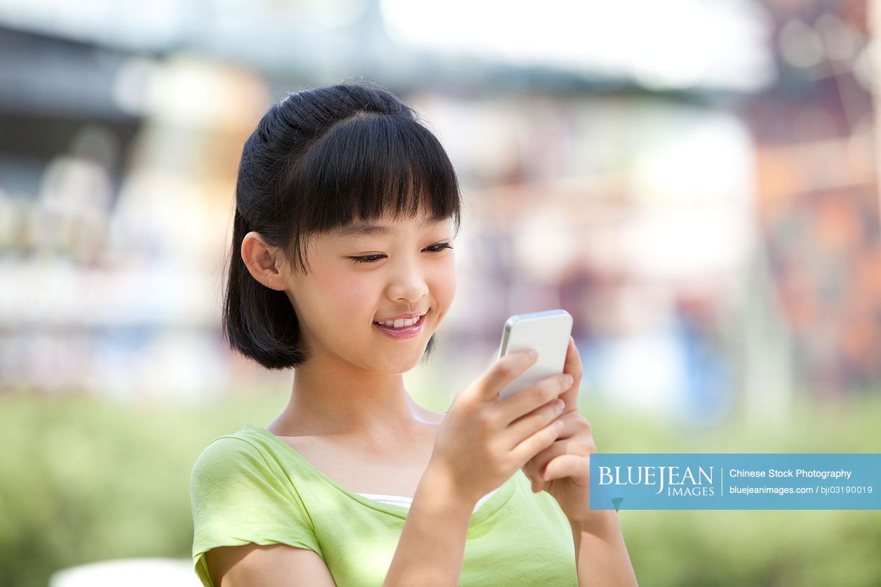 Chinese schoolgirl and smart phone