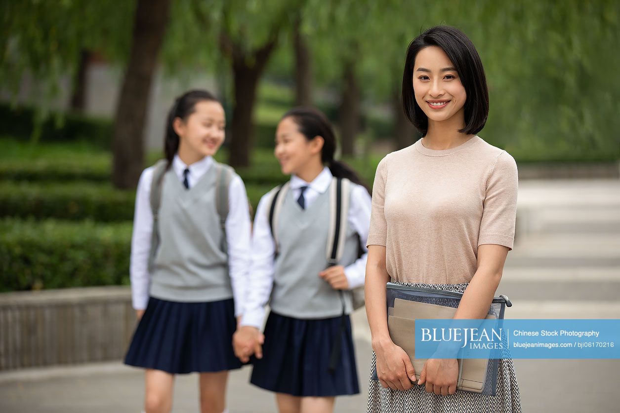 Chinese teacher and students on campus
