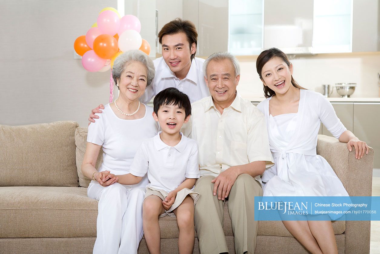 Portrait of a Chinese three generation family at home
