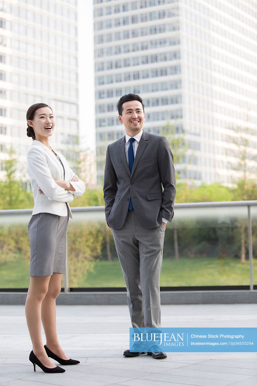 Chinese business person looking at view