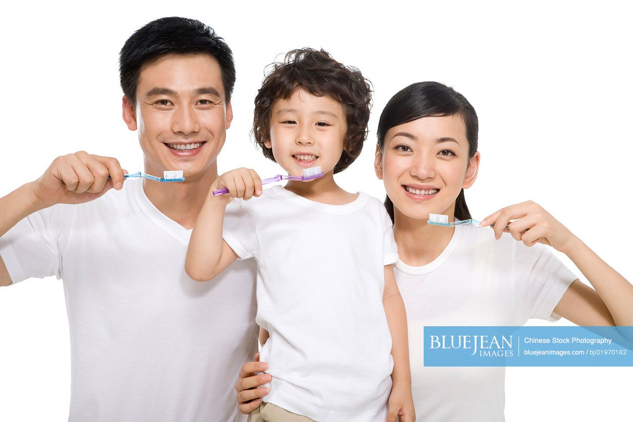 Chinese family brushing teeth